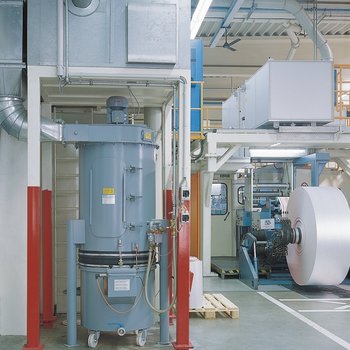Wet scrubber for laser perforation on a rotary punch