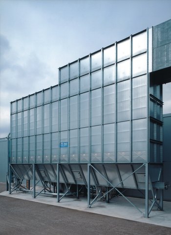 Reverse air filter for dust collection in a laminate production line