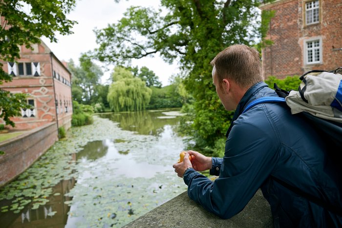 Employee Christian Menke takes a break from hiking
