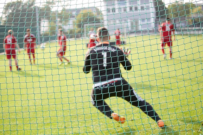 Goalkeeper save from behind the goal
